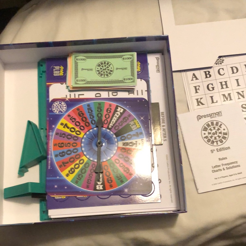 Blue and Red Puzzle Game with Vibrant Wheel - Picture 3 of 4